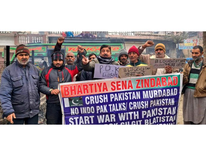 MSJK activists raise slogans during a protest demonstration at Jammu on Monday.