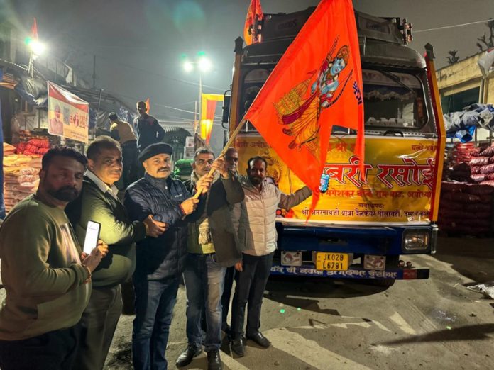 J&K BJP Vice-President Yudhvir Sethi flagging off a truck carrying ration to Ayodhya from Jammu on Saturday.