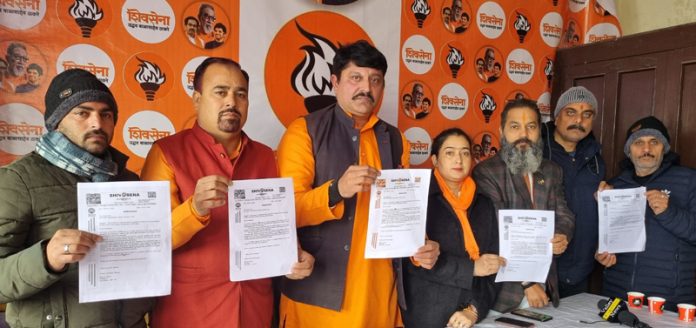 Shiv Sena leaders display a memorandum during a press conference at Jammu on Thursday.