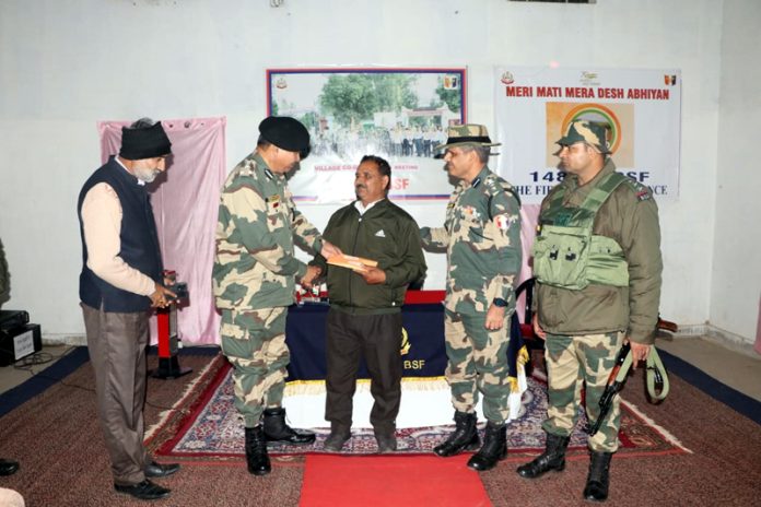 BSF DIG, Chiter Pal, felicitating Nandpur resident Bhagwan Dass in a function on Friday.