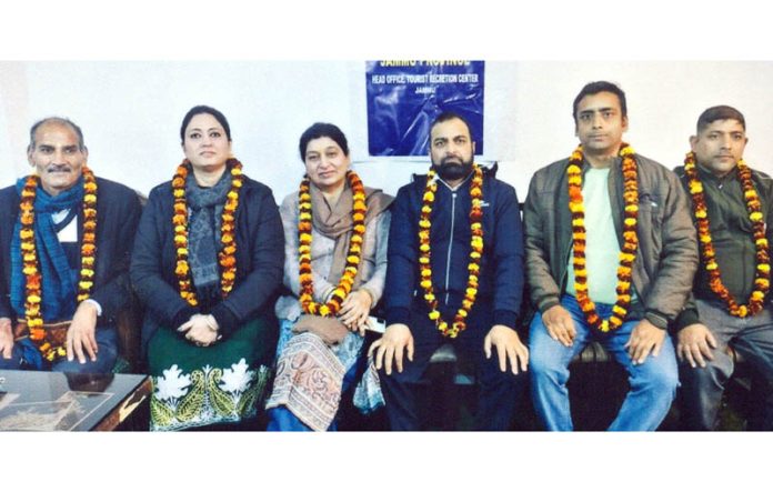 Newly elected office bearers of JKTDC Employees Union posing for a photograph at Jammu on Tuesday.