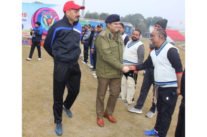 Dr Vinod Kumar, SSP Jammu interacting with players during a cricket match at Jammu on Friday.
