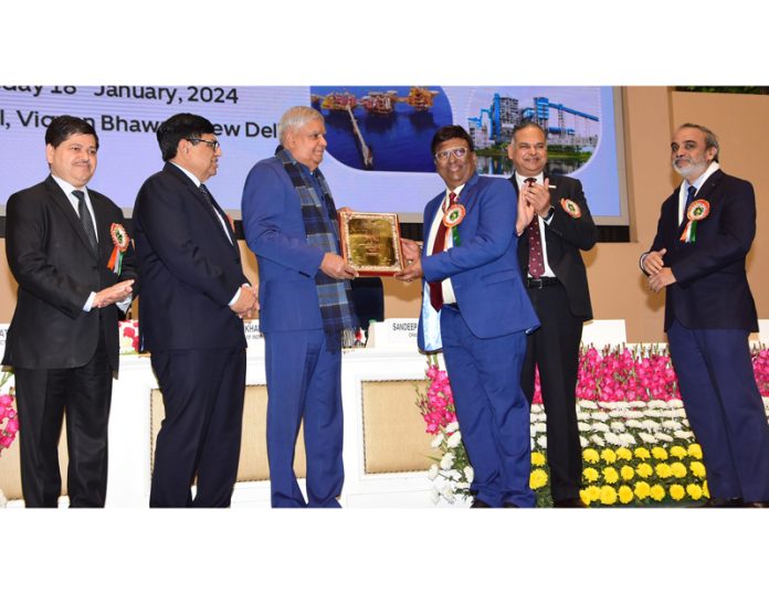 Jagdeep Dhankhar, Vice President of India presenting award to R.K. Vishnoi, CMD, NHPC and Uttam Lal, Director (Personnel), NHPC on Thursday.