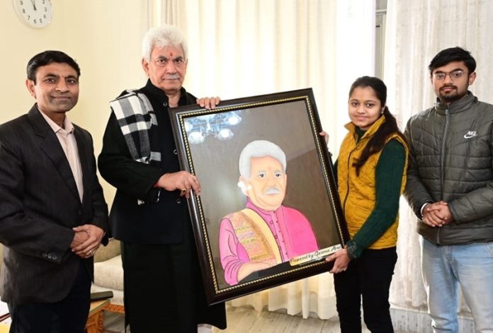 Garima Abrol, a student of Class 11th presents a three-dimensional portrait painting to LG Manoj Sinha. The young painter's efforts and artistic talent were acknowledged by Lieutenant Governor.