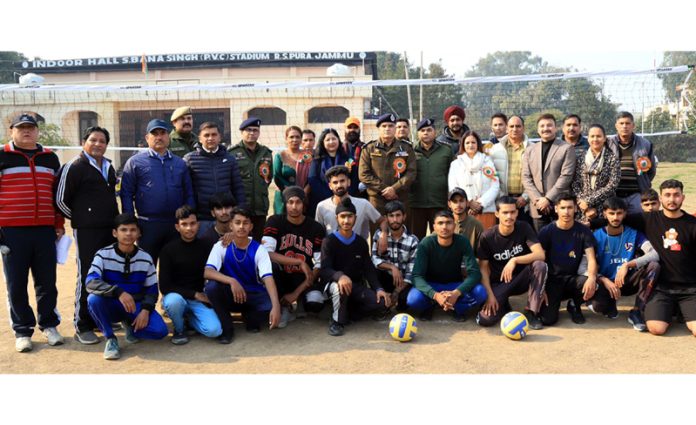 Volleyball players posing with dignitaries during a tournament at RS Pura, Jammu on Thursday.