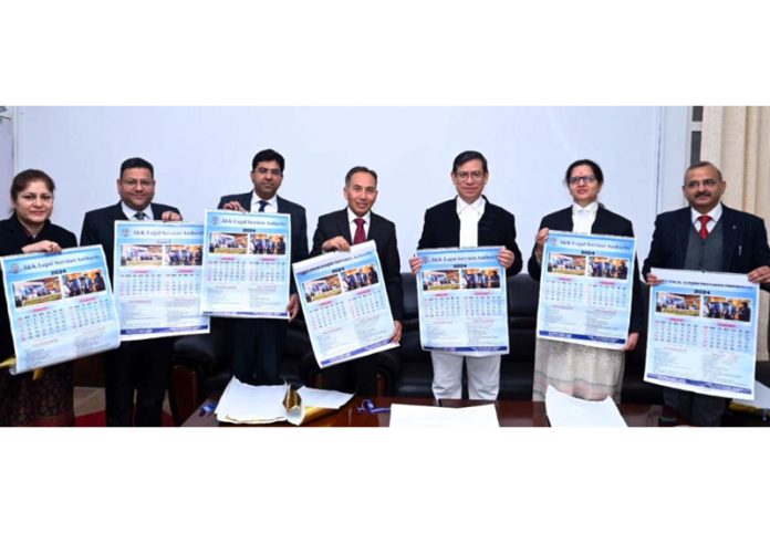 Chief Justice of High Court Justice N Kotiswar along with others unveiling the activity calendar 2024 on Tuesday.