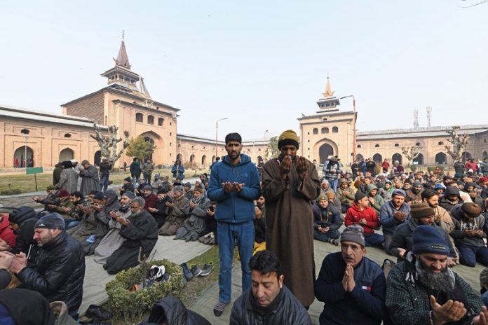 People offering special prayers at Jamia Masjid in Srinagar on Friday. -Excelsior/Shakeel