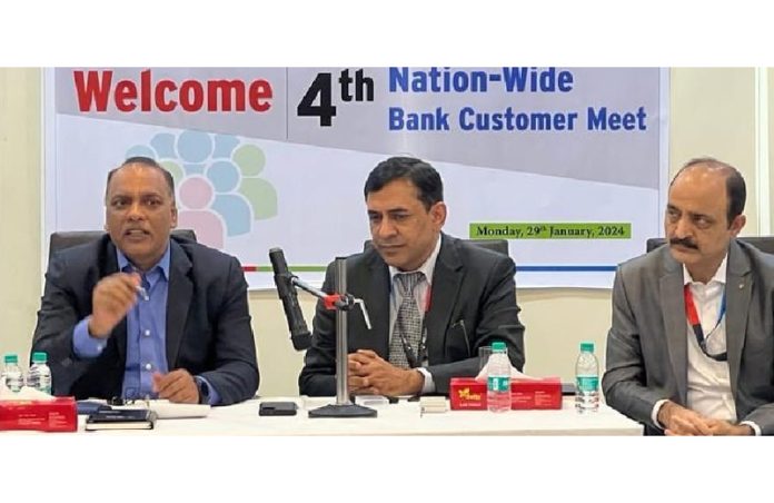 J&K Bank MD & CEO, Baldev Prakash, flanked by other dignitaries, during the 4th Bank-Customer outreach meeting in Mumbai on Monday.