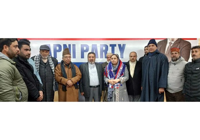 Apni Party president Altaf Bukhari, flanked by others, welcoming Adv Rabia Khursheed into party fold during a meeting at Srinagar.