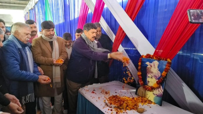 MP Jugal Kishore Sharma and former Minister Sukhnandan Choudhary paying floral tribute to former MLA Ram Nath Manhas at Khour on Sunday.