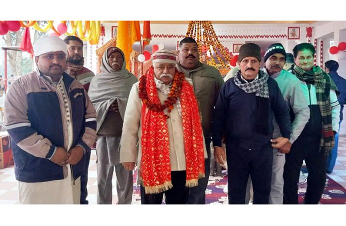 NC leader Ajay Kumar Sadhotra paying obeisance at Baba Kapil Muni Ji Ram Temple in Jammu on Sunday.