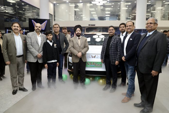 Rajinder Singh Tara, Transport Commissioner launching All-Electric XUV400 Pro Range at Jammu Motors in Jammu on Friday.