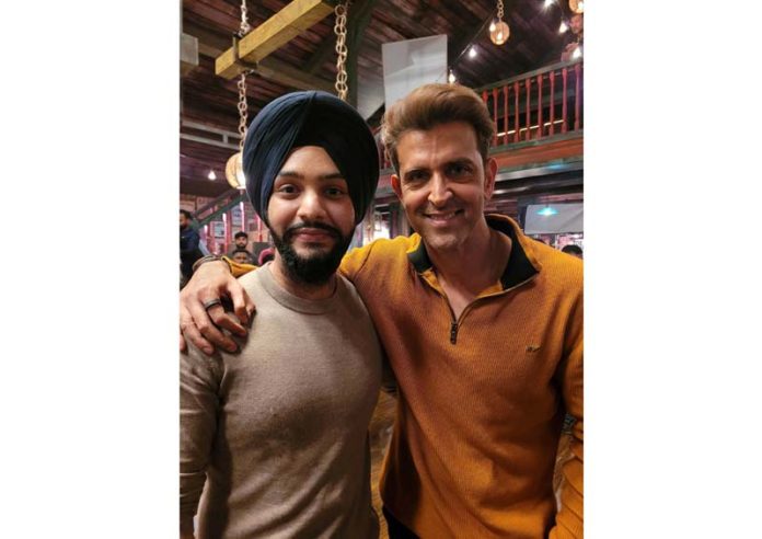 Banveen Singh poses for a photograph with Hrithik Roshan.