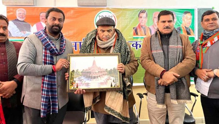 BJP general secretary (Org), Ashok Koul being presented portrait of Ram Temple by party leaders at Talab Tillo on Friday.