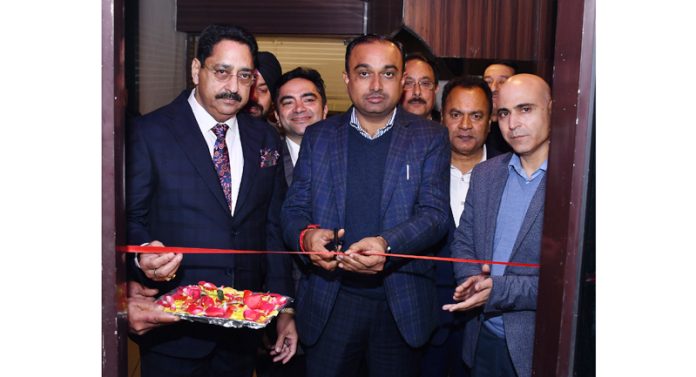 Divisional Commissioner Jammu, Ramesh Kumar, cutting the traditional ribbon to inaugurate a micro-brewery at Amar Singh Club in Jammu on Wednesday.