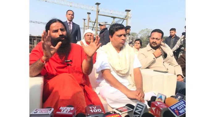Yog Guru Baba Ramdev addressing a press conference at Haridwar.