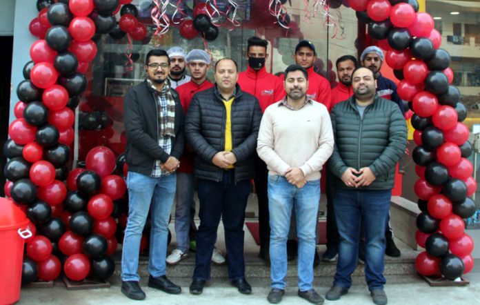 Dignitaries posing for a photograph during the opening of House of Shawarma at Channi Himmat in Jammu. -Excelsior/Rakesh