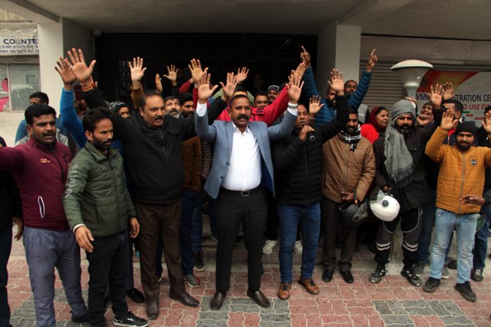 JMC Safai Karamcharis raising slogans during a protest in Jammu on Tuesday.