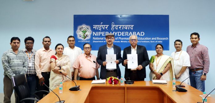 Representatives of NISR Leh and NIPER Hyderabad displaying copies of MoU signed between the two institutes.