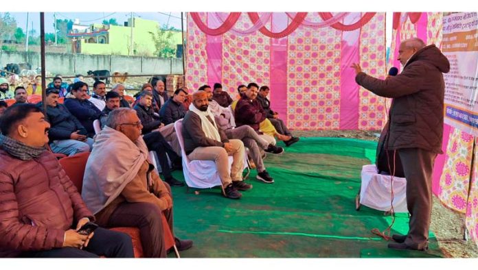 Sham Lal Sharma addressing a gathering in Akhnoor on Friday.