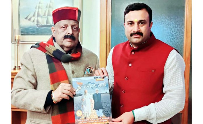 Mahant Rohit Shastri calling on senior BJP leader Devender Singh Rana.