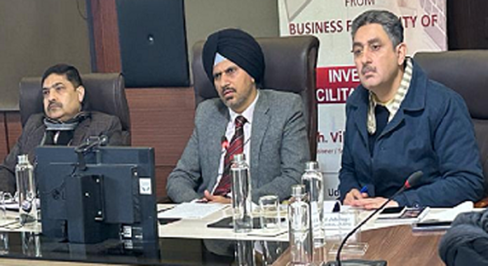 Vikramjit Singh chairing a meeting.