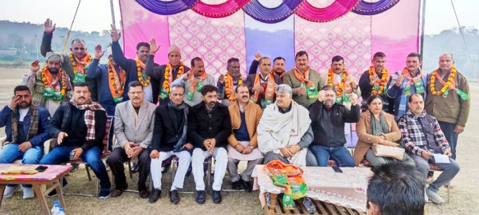 Senior BJP leader with new entrants in the party during a programme in Vijaypur Assembly segment.