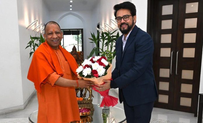 Union Minister for Informationa and Broadcasting / Youth Affairs and Sports Anurag Thakur call on Uttar Pradesh Chief Minister Yogi Adityanath, in Lucknow on Saturday. (UNI)