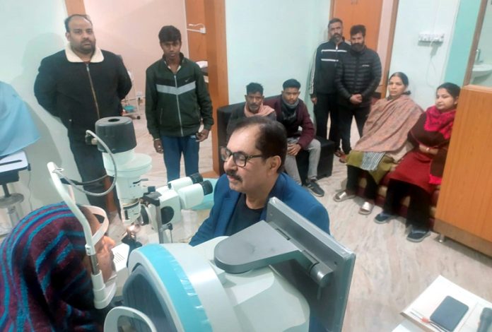 Dr D P Gupta, Consultant Eye Surgeon operating a patient during a free eye camp on Sunday.