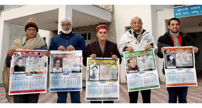 President of Dogri Sanstha Jammu, Prof Lalit Magotra and others during release of calendar for 2024.