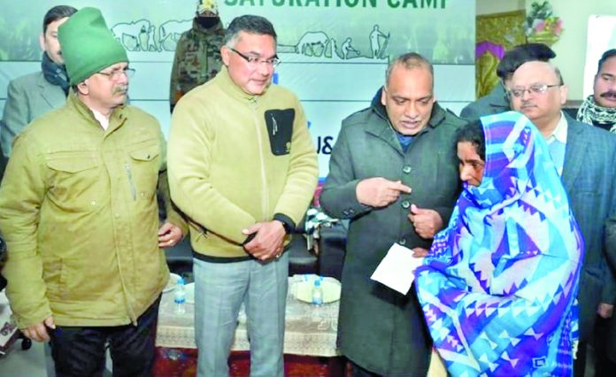 J&K Bank's MD & CEO Baldev Prakash along with the Principal Secretary, Agriculture Department, Shailendra Kumar during a camp in Jammu on Saturday.