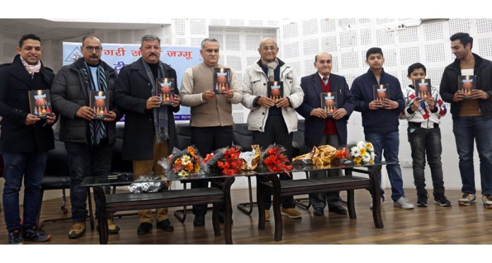DIG JKS Range Shakti Pathak and other dignitaries releasing Dogri Novel ‘Putliyan’. -Excelsior/Rakesh