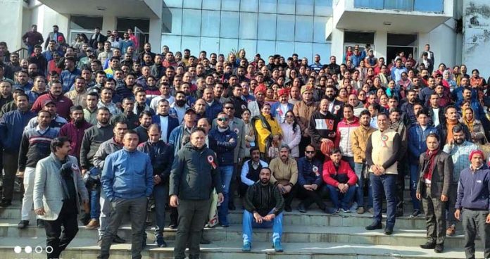 Members of JKTJAC posing with DSEJ Ashok Sharma after a convention at Udhampur on Wednesday.