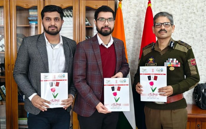 DGP, R.R Swain along with others releasing Hindi magazine 'Tavishi' in Jammu on Tuesday.