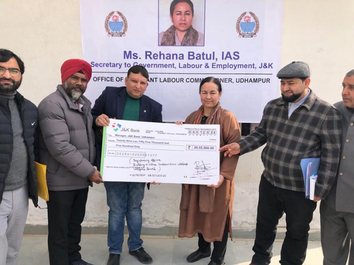 Rehana Batul, Secretary Labour and Employment Deptt releasing financial assistance in favour of construction workers in Udhampur on Thursday.