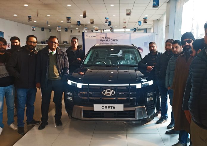 Akshay Jamwal, Siddhant Chowdhary along with Raju Chowdhary-Chairman-KC Group launching New Hyundai Creta in Srinagar on Thursday.