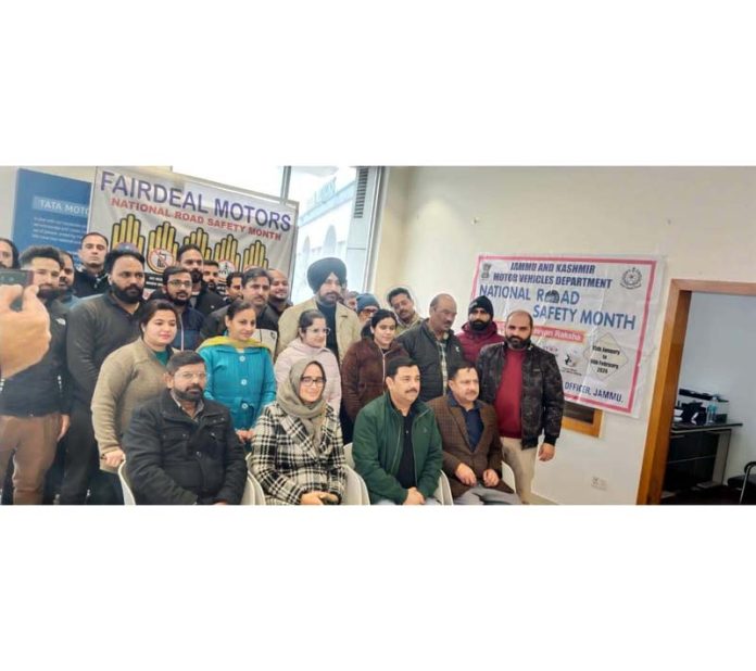 ARTO Headquarters, Jammu Rehana Tabassum along with officials, management of Fairdeal Motors posing during a road safety month programme on Thursday.