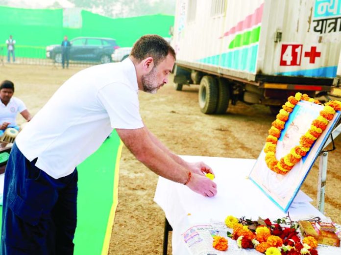 Congress leader Rahul Gandhi pays tribute to Mahatma Gandhi on Martyrs Day, observed to mark the death anniversary of the father of the nation, at the campsite of Bharat Jodo Nyay Yatra, in Araria district, on Tuesday. (UNI)