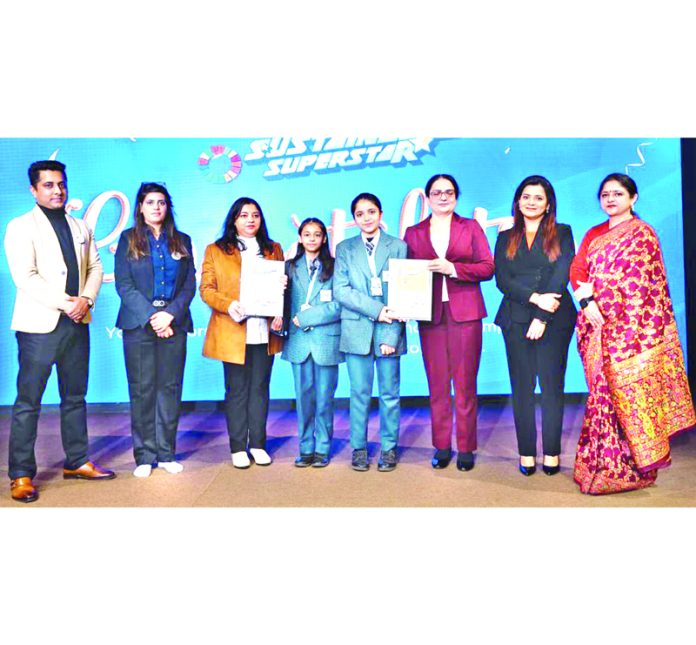 Rohini Aima, Principal cum Vice-Chairperson of JSS posing along with students and organisers at Delhi.