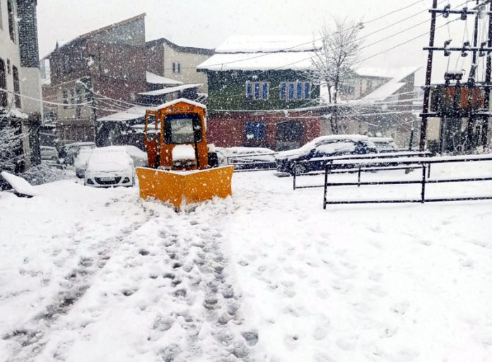 Fresh snowfall at Bhaderwah on Thursday. -Excelsior/Tilak Raj