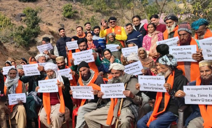 New entrants in Shiv Sena posing for a group photograph at Krimchi in Udhampur on Monday.