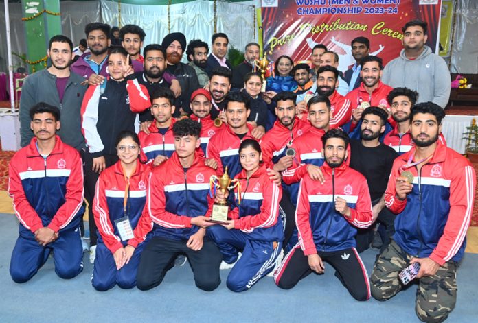 Jammu University Wushu team posing with dignitaries on Saturday.