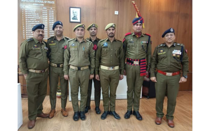 ADGP Jammu Zone, Anand Jain, along with the newly promoted police personnel at ZPHQ Jammu on Monday.