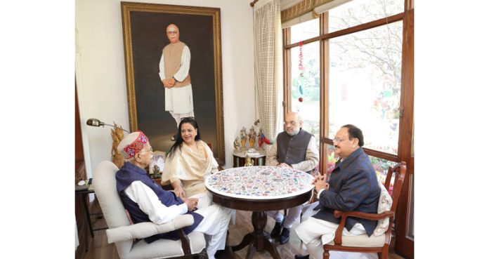 Union Home Minister Amit Shah and BJP National President J P Nadda meeting with veteran BJP leader L K Advani, in New Delhi on Tuesday. (UNI)