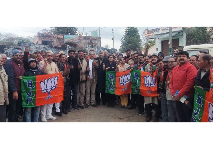 New entrants posing with senior BJP leaders during a party programme at Ghagwal Mandal in Samba district.