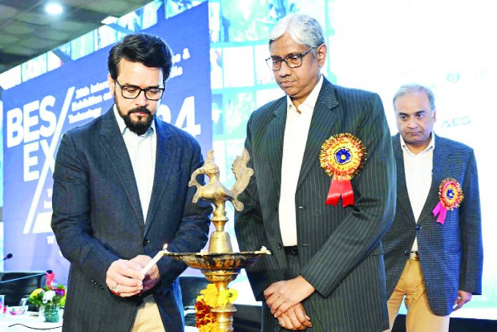 Union Minister for Information and Broadcasting, Youth Affairs and Sports, Anurag Singh Thakur lighting the lamp at the 28th International conference and exhibition on broadcast and media technology – “BES EXPO 2024” at Pragati Maidan, in New Delhi on Thursday. (UNI)