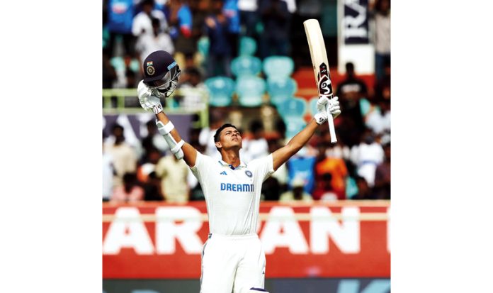 Yashasvi Jaiswal raises his bat after scoring century against England at Visakhapatnam on Friday.