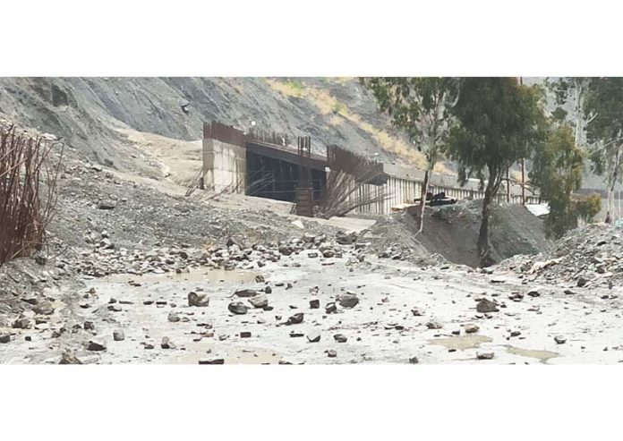 Jammu-Srinagar highway blocked due to landslides and shooting stones in Ramban area on Monday. -Excelsior/Parvaiz Mir