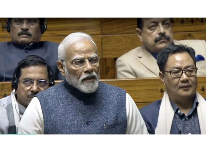 Prime Minister Narendra Modi speaks in the Lok Sabha in New Delhi on Saturday. (UNI)