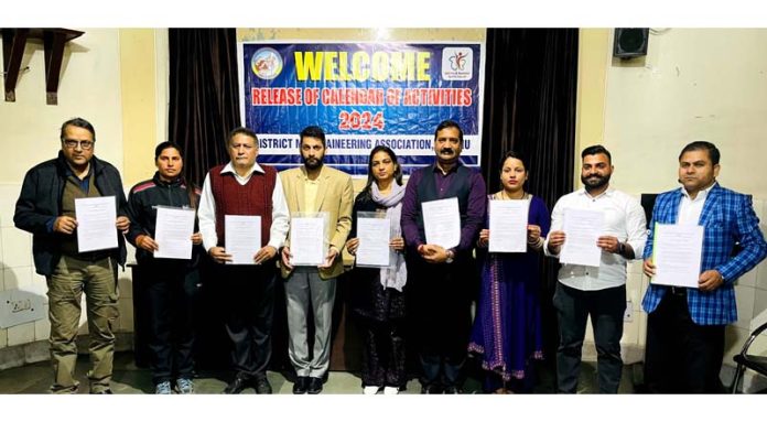 Members of District Mountaineering Association Jammu releasing Calendar of Activities for the year 2024 at Jammu on Saturday.